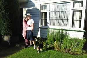 Happy Homeowners with Their Pet – New Beginnings