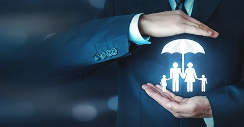 Hands Protecting a Family with an Umbrella – Comprehensive Insurance Solutions